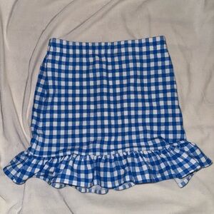 Blue gingham ruffle hem mini skirt.